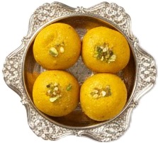 a bowl filled with three yellow balls.jpg